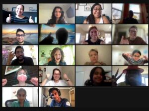 Screenshot of Zoom Meeting of Expressive Leaders - a group of students and mentors, including Maddy, cheering for the photo.